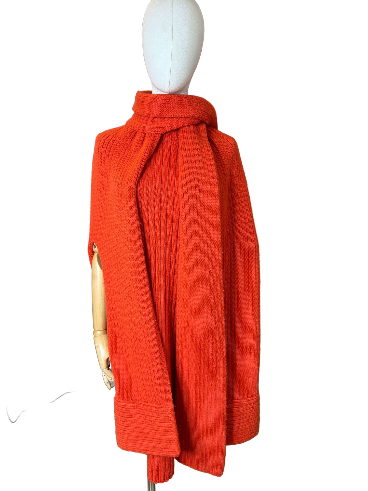 vintage 1990s orange knit dress set featuring a stylish ribbed cape with scarf.