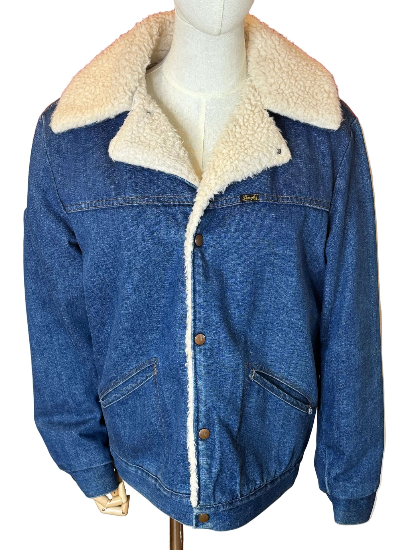 Vintage 1970s Wrangler Wrange coat with Sherpa lining, featuring original buttons and a cozy denim design.